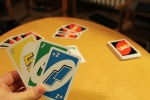 how to win uno, uno rule, uno gives official rule to play now you can end the game on an action card, Card game