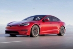 Tesla car without steering, Tesla new electric car videos, tesla to launch electric hatchback without a steering wheel, Tesla car without steering